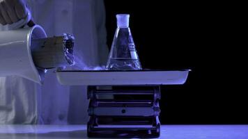 Bottle and liquid nitrogen in a laboratory. Chemical experiment. Flask with water and dry ice boiling chemical experiment photo