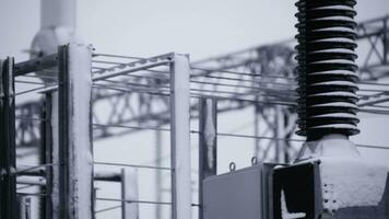 Switchgears and switches in a power plant with steel structure. Power plant detail, high voltage isolation. Voltage transformers at the power plant photo