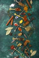 Assortment of different Indian spices and herbs photo