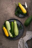 Assortment of different color of zucchini photo