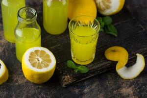 Traditional italian limoncello or lemon liquor photo