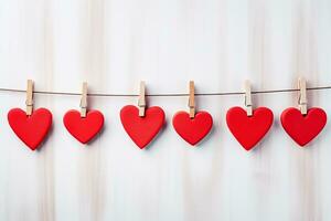 AI generated Red hearts hang on wooden clothes pegs on white color background, Happy valentine day concept photo