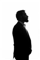 AI generated Silhouette of a thinking businessman on isolated white background photo