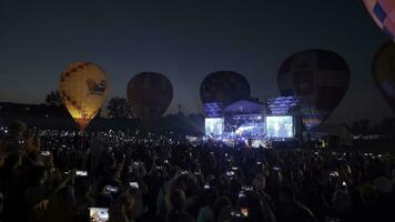 Serbia, Belgrade - Jule 20, 2023. Clip. Beautiful night view of balloons in the night darkness. photo