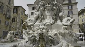 Italy, Rome - August 10, 2022. Beautiful fountain with sculptures. Action. Sculptural composition in fountain in city center. European attraction - Neptune Fountain in Rome photo