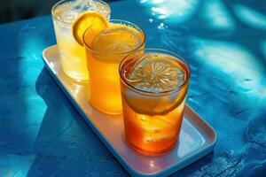 AI generated three glasses of lemonade sitting on a white tray photo