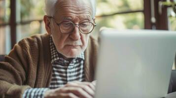 AI generated Generative AI, Senior man working with a laptop computer at the table, wearing glasses, learning to use a computer photo