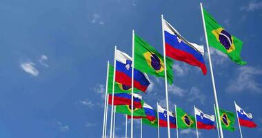 Slovenia and Brazil Flags Waving Together in the Sky, Seamless Loop in Wind, Space on Left Side for Design or Information, 3D Rendering video