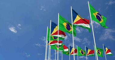 Seychelles and Brazil Flags Waving Together in the Sky, Seamless Loop in Wind, Space on Left Side for Design or Information, 3D Rendering video