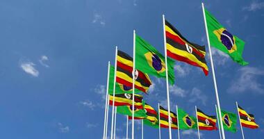 Uganda and Brazil Flags Waving Together in the Sky, Seamless Loop in Wind, Space on Left Side for Design or Information, 3D Rendering video