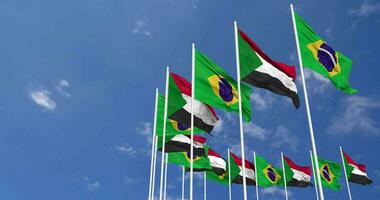 Soudan et Brésil drapeaux agitant ensemble dans le ciel, sans couture boucle dans vent, espace sur la gauche côté pour conception ou information, 3d le rendu video