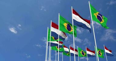 Netherlands and Brazil Flags Waving Together in the Sky, Seamless Loop in Wind, Space on Left Side for Design or Information, 3D Rendering video