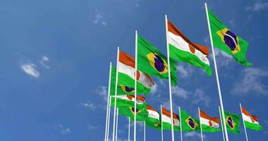 Niger and Brazil Flags Waving Together in the Sky, Seamless Loop in Wind, Space on Left Side for Design or Information, 3D Rendering video