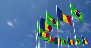 Romania and Brazil Flags Waving Together in the Sky, Seamless Loop in Wind, Space on Left Side for Design or Information, 3D Rendering video