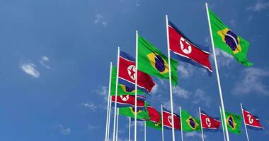 North Korea and Brazil Flags Waving Together in the Sky, Seamless Loop in Wind, Space on Left Side for Design or Information, 3D Rendering video