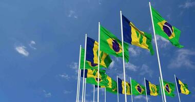 Saint Vincent and the Grenadines and Brazil Flags Waving Together in the Sky, Seamless Loop in Wind, Space on Left Side for Design or Information, 3D Rendering video