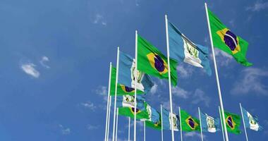 Guatemala y Brasil banderas ondulación juntos en el cielo, sin costura lazo en viento, espacio en izquierda lado para diseño o información, 3d representación video