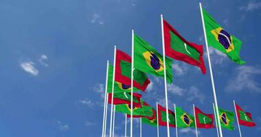 Maldives and Brazil Flags Waving Together in the Sky, Seamless Loop in Wind, Space on Left Side for Design or Information, 3D Rendering video