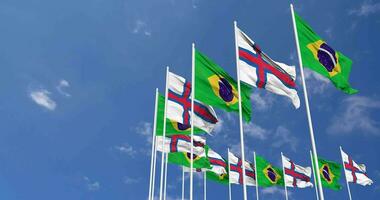 Faroe Islands and Brazil Flags Waving Together in the Sky, Seamless Loop in Wind, Space on Left Side for Design or Information, 3D Rendering video