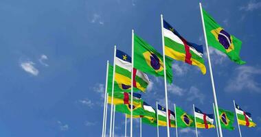 Central African Republic and Brazil Flags Waving Together in the Sky, Seamless Loop in Wind, Space on Left Side for Design or Information, 3D Rendering video