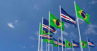 Cape Verde, Cabo Verde and Brazil Flags Waving Together in the Sky, Seamless Loop in Wind, Space on Left Side for Design or Information, 3D Rendering video