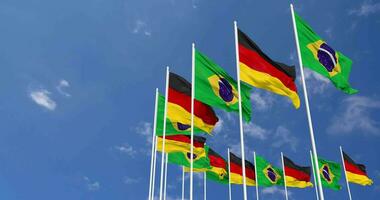 Germany and Brazil Flags Waving Together in the Sky, Seamless Loop in Wind, Space on Left Side for Design or Information, 3D Rendering video