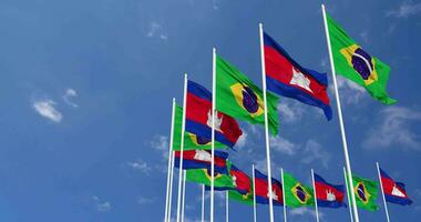 Kambodscha und Brasilien Flaggen winken zusammen im das Himmel, nahtlos Schleife im Wind, Raum auf links Seite zum Design oder Information, 3d Rendern video