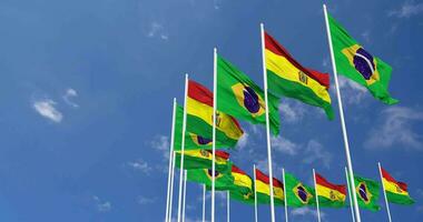 Bolivia and Brazil Flags Waving Together in the Sky, Seamless Loop in Wind, Space on Left Side for Design or Information, 3D Rendering video