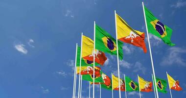 Bhutan und Brasilien Flaggen winken zusammen im das Himmel, nahtlos Schleife im Wind, Raum auf links Seite zum Design oder Information, 3d Rendern video