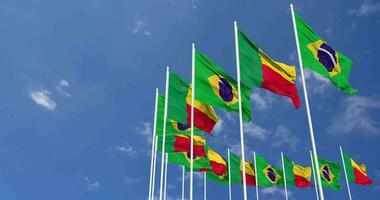 Benin and Brazil Flags Waving Together in the Sky, Seamless Loop in Wind, Space on Left Side for Design or Information, 3D Rendering video