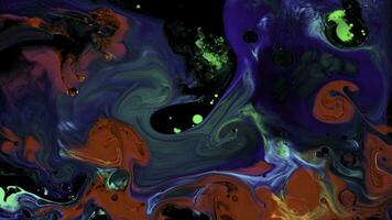 Fluid art background with colorful tints liquid surface. Stock footage. Amazing effect of acrylic paints on black canvas, mixing different bright colors. photo