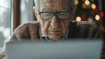 AI generated Generative AI, Senior man working with a laptop computer at the table, wearing glasses, learning to use a computer photo