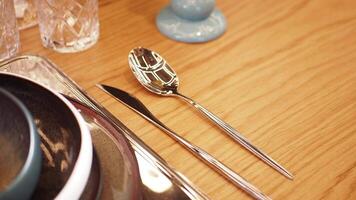 knife spoon set of kitchen utensils on a wooden background video