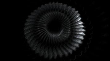 Black background. Motion. A huge long spring of gray and blue color moves in a spiral in animation. photo