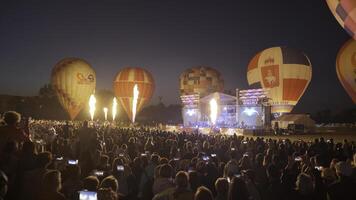 Serbia, Belgrade - Jule 20, 2023. Clip. Beautiful night view of balloons in the night darkness. photo