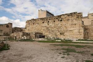 Ancient Ruins of Hadrians library on the North Side of the Acropolis Athens, Greece photo