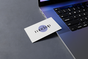 Business Card Mockup with Laptop psd