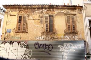 Athens, Greece, December 14 2023 Abandon home full of graffiti that can be found all over Athens Greece photo