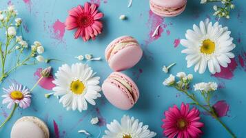 AI generated Macaroons, and flowers on a blue background with pink and white daisies and daisies photo