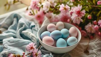 AI generated A white bowl filled with blue and pink eggs sitting on top of a table next to a bunch of flowers photo