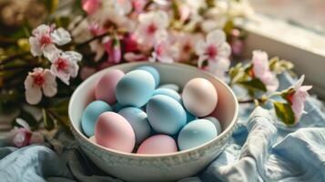 AI generated A white bowl filled with blue and pink eggs sitting on top of a table next to a bunch of flowers photo