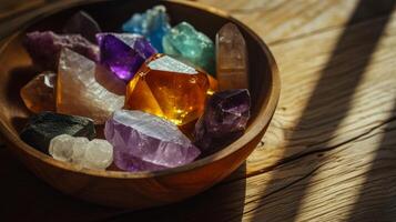 AI generated Variety of colourful healing crystals inside wooden bowl with sunlight and shadows with copy space photo