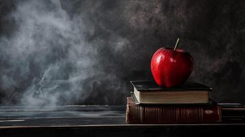 ai generado un rojo manzana sentado en parte superior de un apilar de libros en parte superior de un negro mesa siguiente a un gris pared con fumar viniendo fuera de el espalda de eso foto