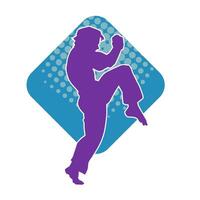 Silhouette of a male doing martial art kick pose. Silhouette of a martial art male doing kicking pose. vector