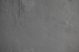 Clásico grunge gris antecedentes de natural cemento o Roca antiguo textura como retro modelo pared. eso es conceptual o metáfora pared bandera, material, Envejecido, oxido o construcción foto