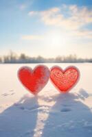 ai generado dos rojo corazones en escarcha en suave nieve en un escarchado soleado día foto