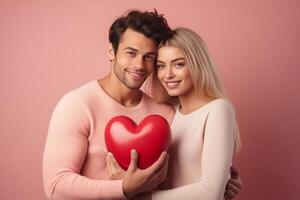 AI generated portrait on a pink background of a hugging young couple holding a heart in their hands photo