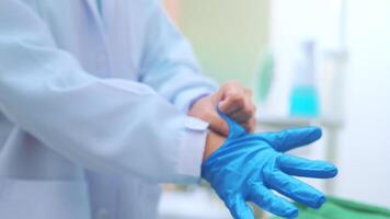 Female dentist wearing medical gloves Prepare to work in a dental clinic, dental concepts and healthcare. video