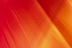 Bright colored blurry strokes and waves in the form of red and orange lines. Abstract background. Place for copy space. photo