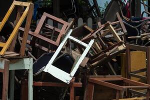 Piles of old boards waiting for recycling photo